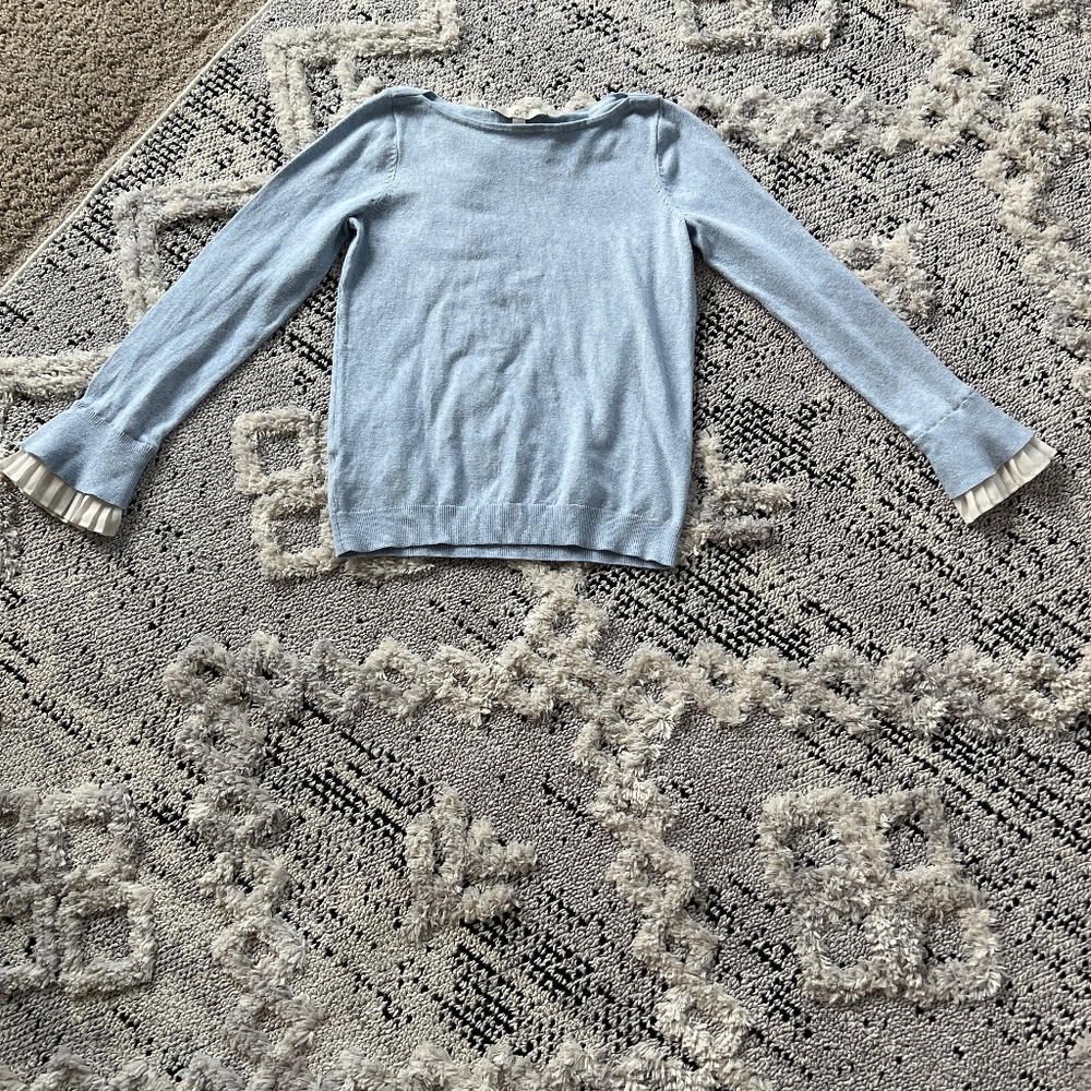 Light blue sweater